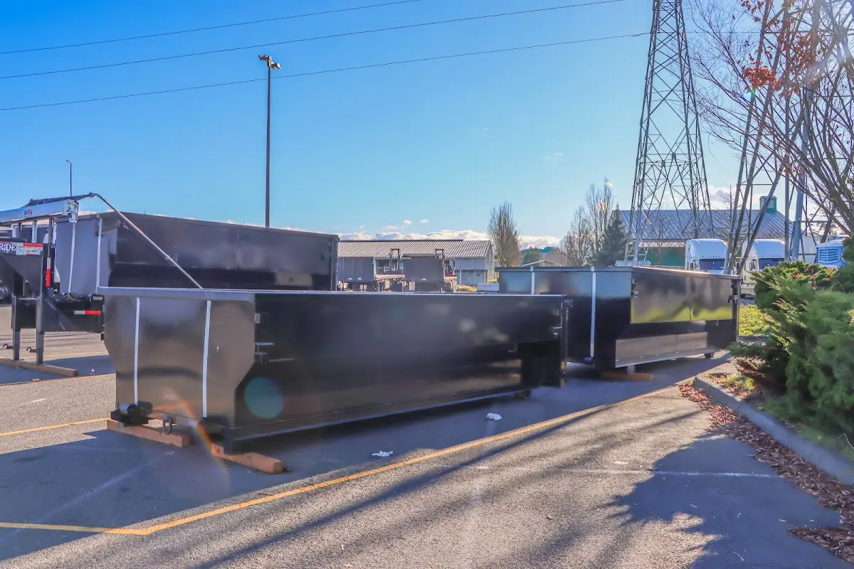 Roll-off dumpster ready for waste disposal at job site for Construction Dumpster Rental in Oak Creek